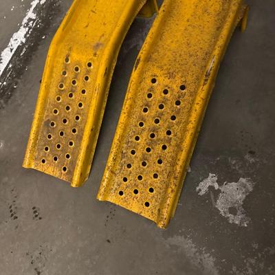 Yellow metal car ramps