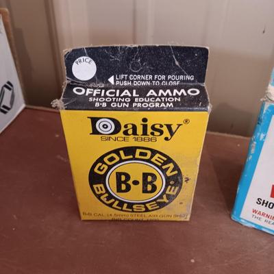 PARTIAL BOXES OF DAISY AND CROSMAN B-B's AND A FULL BOX OF 16 GAUGE SHOTGUN SHELLS