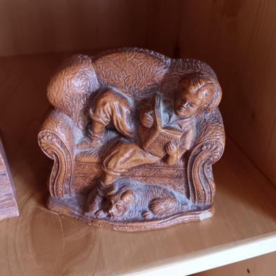 VARIETY OF BOOKS, BOOK ENDS AND A CAST IRON DOOR STOP