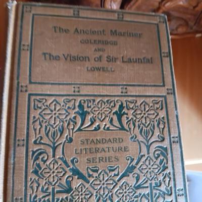 VARIETY OF BOOKS, BOOK ENDS AND A CAST IRON DOOR STOP