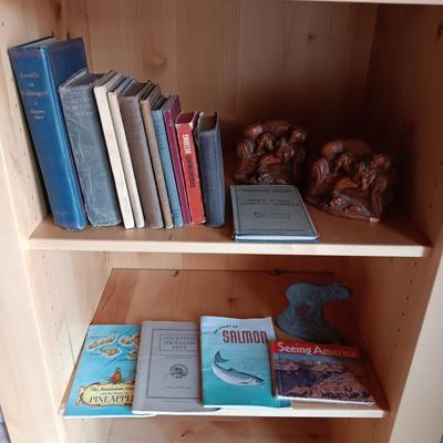 VARIETY OF BOOKS, BOOK ENDS AND A CAST IRON DOOR STOP