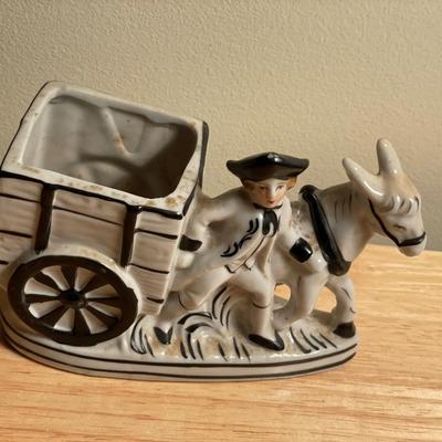 Japan boy with horse planter