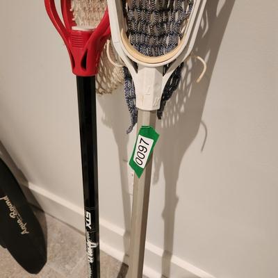 2 Lacrosse Sticks Triax DeBreer 6000 , Stx Amp