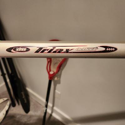 2 Lacrosse Sticks Triax DeBreer 6000 , Stx Amp