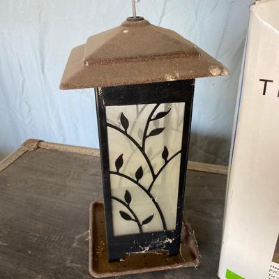 THREE SEAT SWING COVER AND A BIRD FEEDER