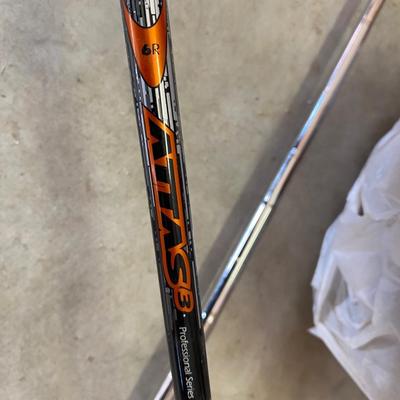 PING AND ARNOLD PALMER DRIVERS, A PIECE OF GREEN TO TEE OFF WITH A BASKET OF GOLF BALLS