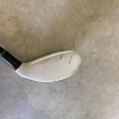 PING AND ARNOLD PALMER DRIVERS, A PIECE OF GREEN TO TEE OFF WITH A BASKET OF GOLF BALLS