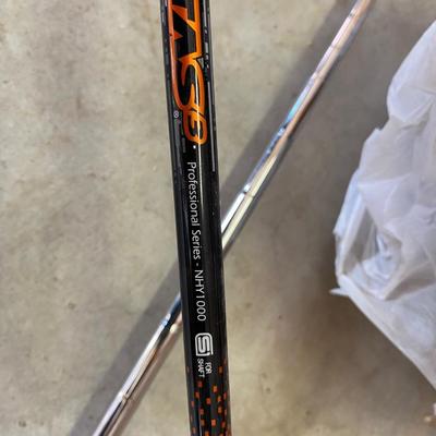 PING AND ARNOLD PALMER DRIVERS, A PIECE OF GREEN TO TEE OFF WITH A BASKET OF GOLF BALLS