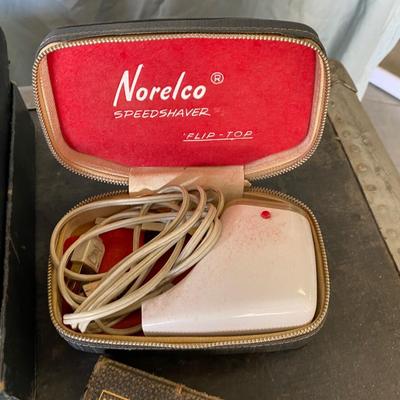 VINTAGE RAZORS, A PIECE OF PETRIFIED WOOD, AN ASH TRAY AND A POCKET BIBLE