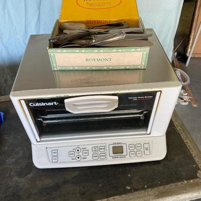 CUISINART TOASTER OVEN AND A BOX OF FLATWARE