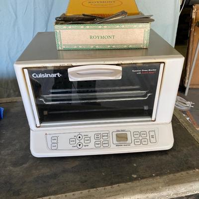 CUISINART TOASTER OVEN AND A BOX OF FLATWARE
