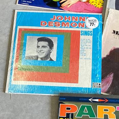 RECORDS ALL THE WAY FROM AN EDISON RECORD TO DECCO PHONOGRAPH RECORDS TO CURRENT DAY VINYL ALBUMS