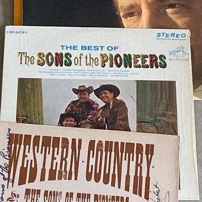 RECORDS ALL THE WAY FROM AN EDISON RECORD TO DECCO PHONOGRAPH RECORDS TO CURRENT DAY VINYL ALBUMS