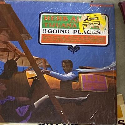 RECORDS ALL THE WAY FROM AN EDISON RECORD TO DECCO PHONOGRAPH RECORDS TO CURRENT DAY VINYL ALBUMS