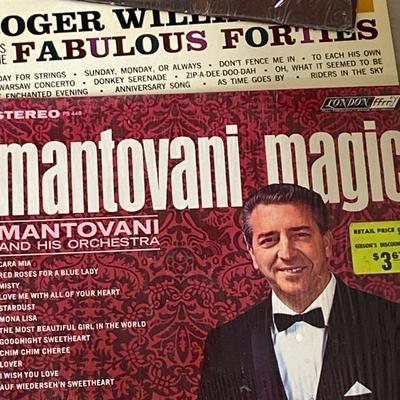 RECORDS ALL THE WAY FROM AN EDISON RECORD TO DECCO PHONOGRAPH RECORDS TO CURRENT DAY VINYL ALBUMS