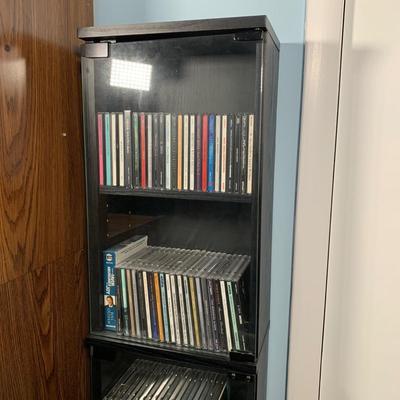 LOT 17 O: Atlantic CD/DVD 4 Tier Glass Door Front Shelving Unit w/ CD's: Neil Diamond "Up On The Roof", Elvis Presley The...
