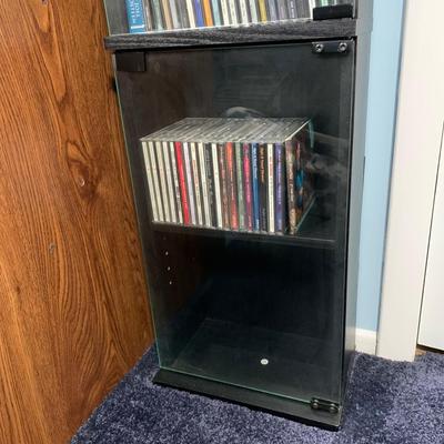 LOT 17 O: Atlantic CD/DVD 4 Tier Glass Door Front Shelving Unit w/ CD's: Neil Diamond "Up On The Roof", Elvis Presley The...