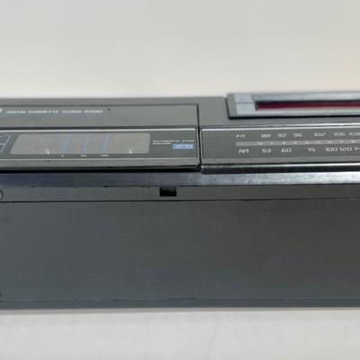 LOT 42L: Vintage Sears Roebuck Cassette AM/FM Clock Radio Model 225 23415 850