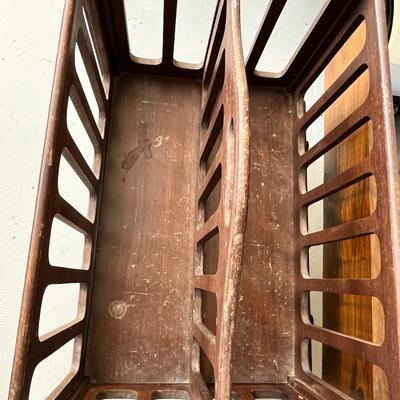 Lot 224 Antique Magazine rack on wheels