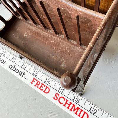 Lot 224 Antique Magazine rack on wheels