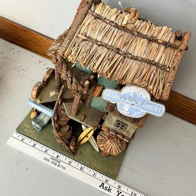 Lot 230 Beachhouse birdhouse and basket of seashells