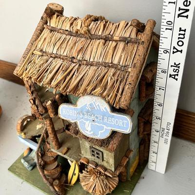 Lot 230 Beachhouse birdhouse and basket of seashells