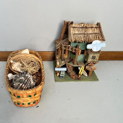 Lot 230 Beachhouse birdhouse and basket of seashells