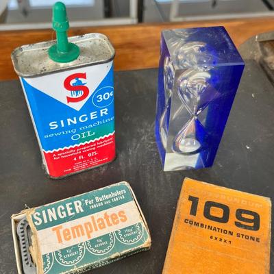 Lot 232 Vintage advertising boxes, knife with sharpening stone and small sewing kit