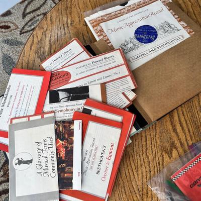 Lot 238 Norman Rockwell Saturday Evening Post magazine, Music Appreciate records in album, 88 Ford Bronco book, 79 Corvette owners manual