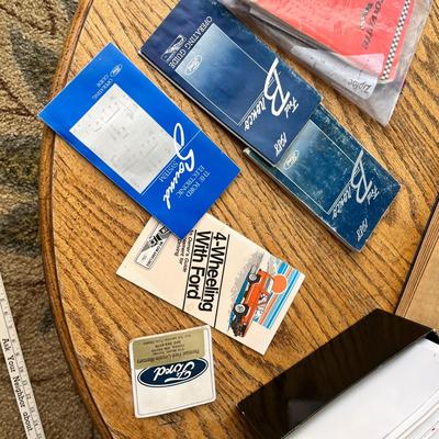 Lot 238 Norman Rockwell Saturday Evening Post magazine, Music Appreciate records in album, 88 Ford Bronco book, 79 Corvette owners manual