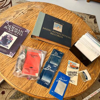 Lot 238 Norman Rockwell Saturday Evening Post magazine, Music Appreciate records in album, 88 Ford Bronco book, 79 Corvette owners manual
