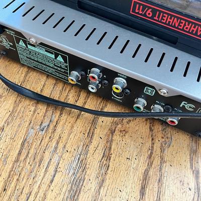 Lot 244 DVD Player and 16 assorted DVDs