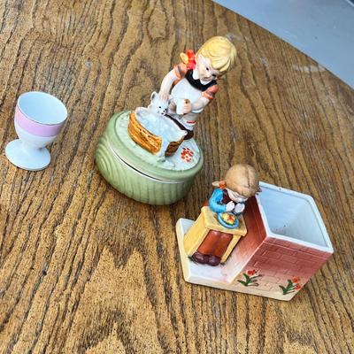 Lot 250 Little girl figurines, music box and pink egg cup