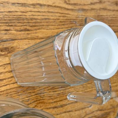 Lot 253 Assorted glass pitchers, vases, small carafe and more