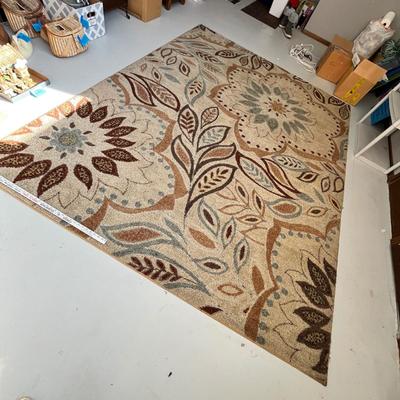 Lot 264 area rug in garage mancave - approximately 7x9