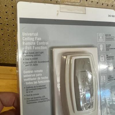 Lot 283 Moen hand towel rack, new smoke detector, ceiling fan remote