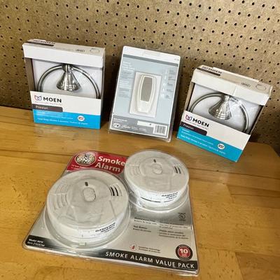 Lot 283 Moen hand towel rack, new smoke detector, ceiling fan remote