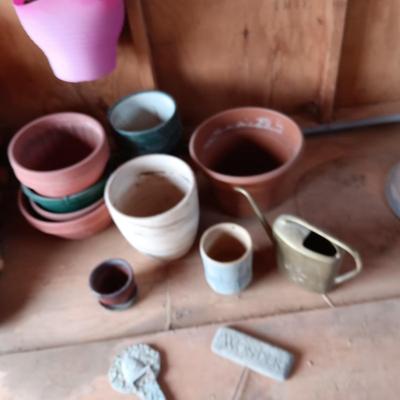A VARIETY OF FLOWER POTS AND 2 STAKED SIGNS
