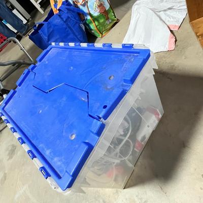 Lot 289 rubbermaid box of cords and power strips