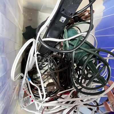 Lot 289 rubbermaid box of cords and power strips