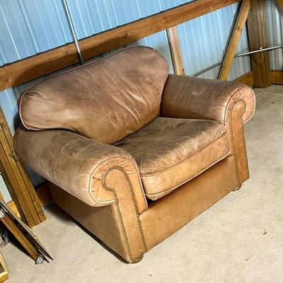 Lot 334 Leather arm chair brown, faded to tan
