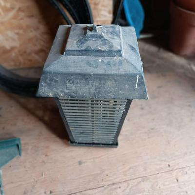 BAG OF FERTILIZER, EDGING, BUG ZAPPER AND GARDEN HOSE
