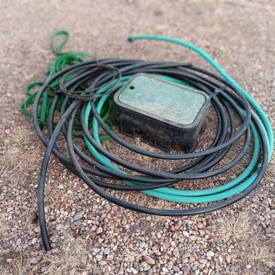 BAG OF FERTILIZER, EDGING, BUG ZAPPER AND GARDEN HOSE