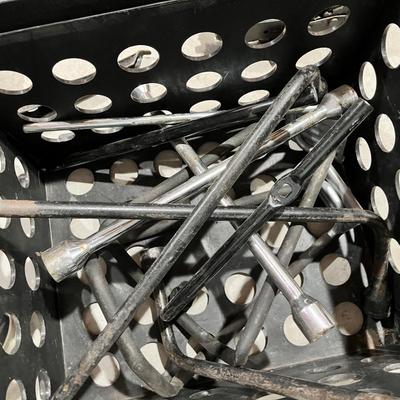 Lot 345 crate of small jacks and tire irons