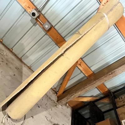 Lot 347 remanans of light beige carpet in the barn