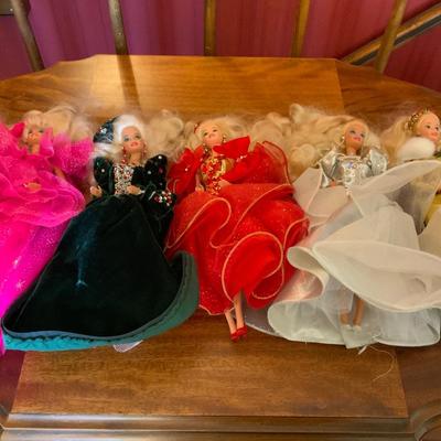 Lot of Holiday Barbies without their boxes.