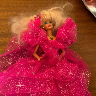 Lot of Holiday Barbies without their boxes.