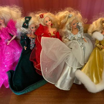 Lot of Holiday Barbies without their boxes.