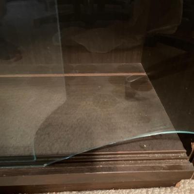 Small display cabinet with glass doors
