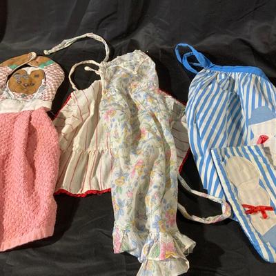 Lot of Childs Vintage Aprons and 1 towel
